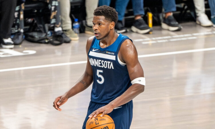 NBA: Anthony Edwards dribbles the ball for the Minnesota Timberwolves against the Dallas Mavericks at American Airlines Center