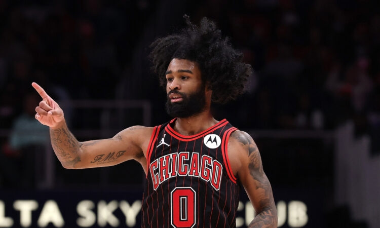 NBA: Coby White reacts after making a three-point shot for the Chicago Bulls against the Atlanta Hawks at State Farm Arena