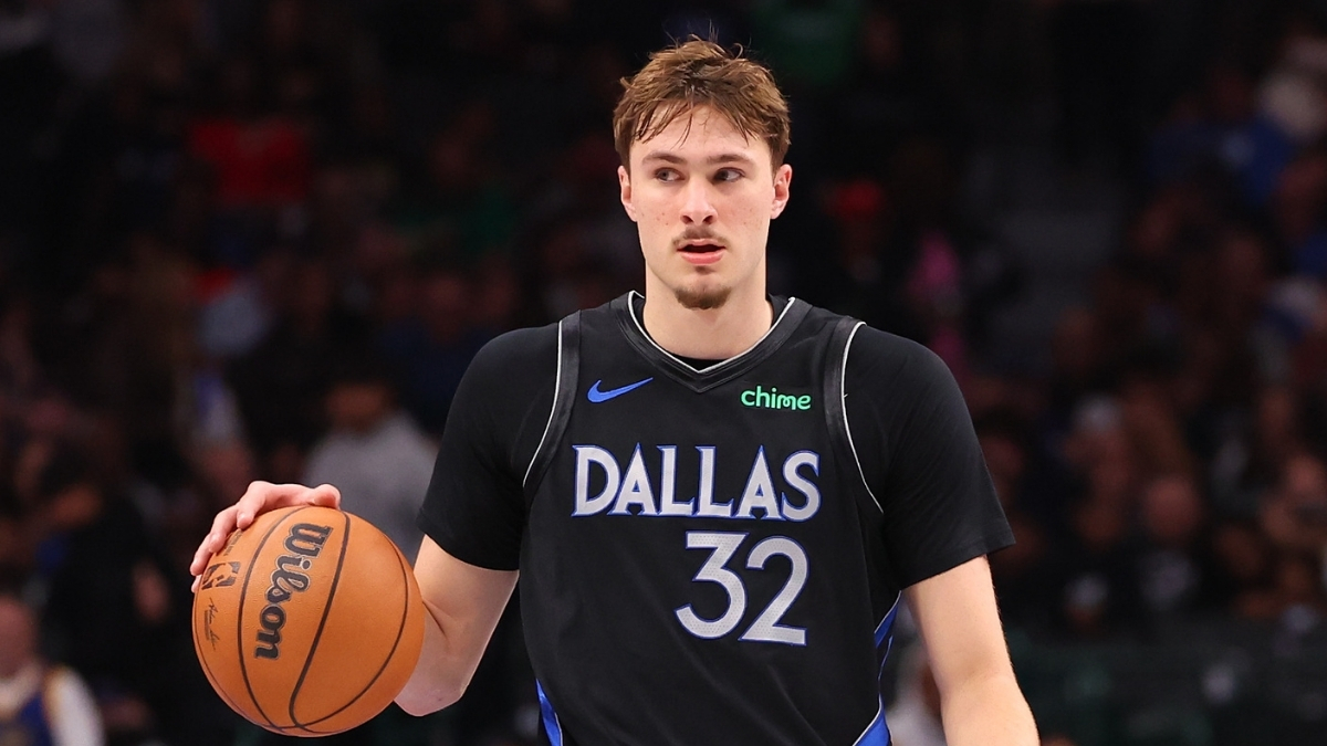NBA: Cooper Flagg controls the ball for the Dallas Mavericks during the second half against the Golden State Warriors at American Airlines Center