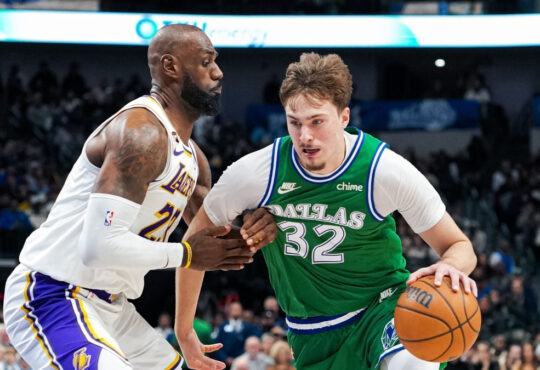 NBA: Cooper Flagg drives to the paint against LeBron James during Dallas Mavericks vs. Los Angeles Lakers at American Airlines Center.