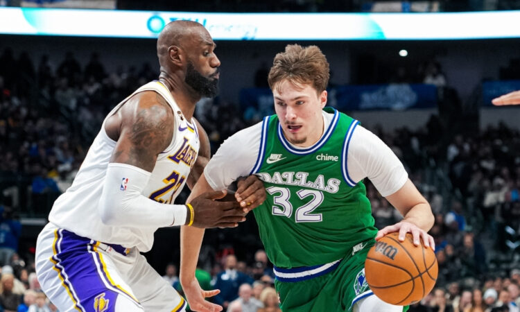 NBA: Cooper Flagg drives to the paint against LeBron James during Dallas Mavericks vs. Los Angeles Lakers at American Airlines Center.