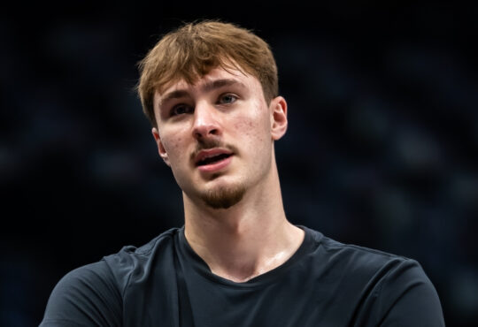Cooper Flagg warms up during a pregame workout for the Dallas Mavericks before their game against the Denver Nuggets at American Airlines Center.