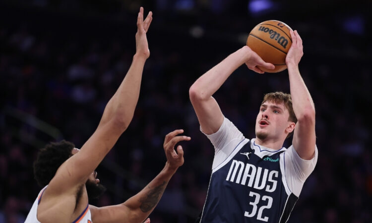 Dallas Mavericks forward Cooper Flagg shoots over New York Knicks center Karl-Anthony Towns during a Jan. 19, 2026 game at Madison Square Garden.