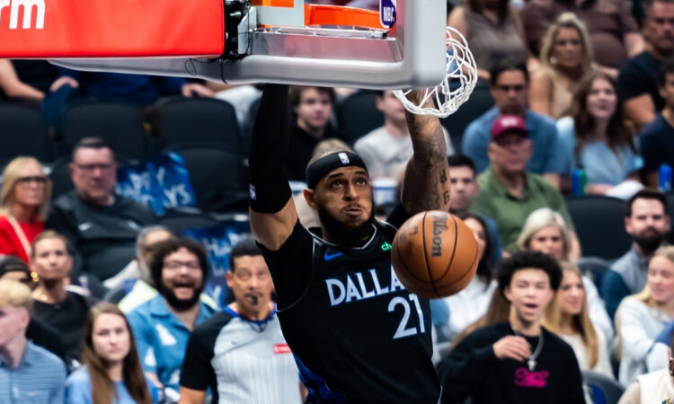 Daniel Gafford dunks the ball for the Dallas Mavericks against the Denver Nuggets
