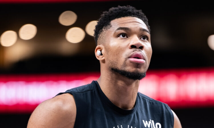 Giannis Antetokounmpo shoots free throws during a pregame workout for the Milwaukee Bucks before facing the Dallas Mavericks NBA
