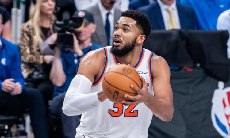 Karl-Anthony Towns prepares to shoot a jump shot for the New York Knicks against the Dallas Mavericks at American Airlines Center