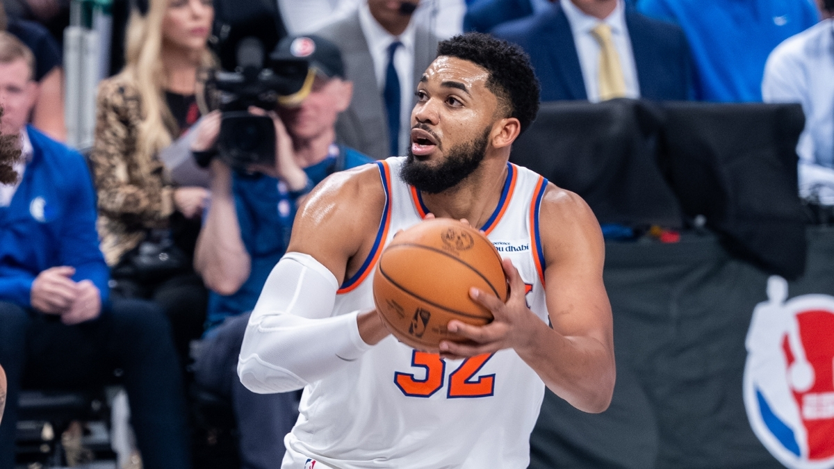 Karl-Anthony Towns prepares to shoot a jump shot for the New York Knicks against the Dallas Mavericks at American Airlines Center