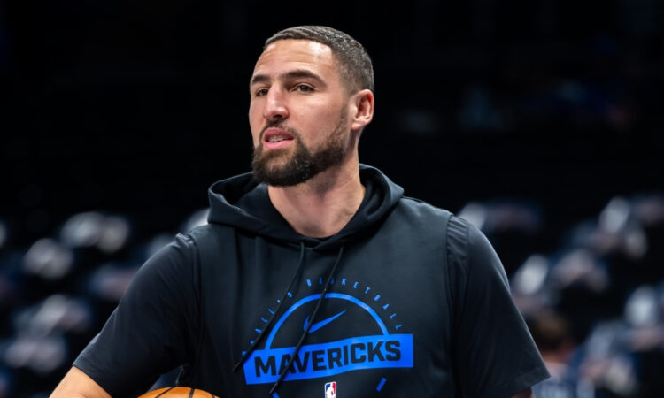 Klay Thompson warms up during a pregame workout for the Dallas Mavericks before facing the Denver Nuggets