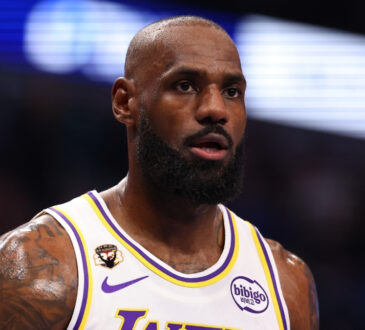 NBA: LeBron James looks on from the court during the first half at American Airlines Center against the Dallas Mavericks