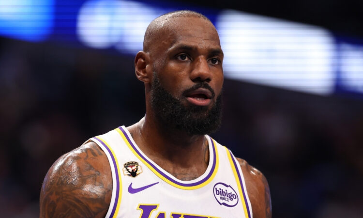NBA: LeBron James looks on from the court during the first half at American Airlines Center against the Dallas Mavericks