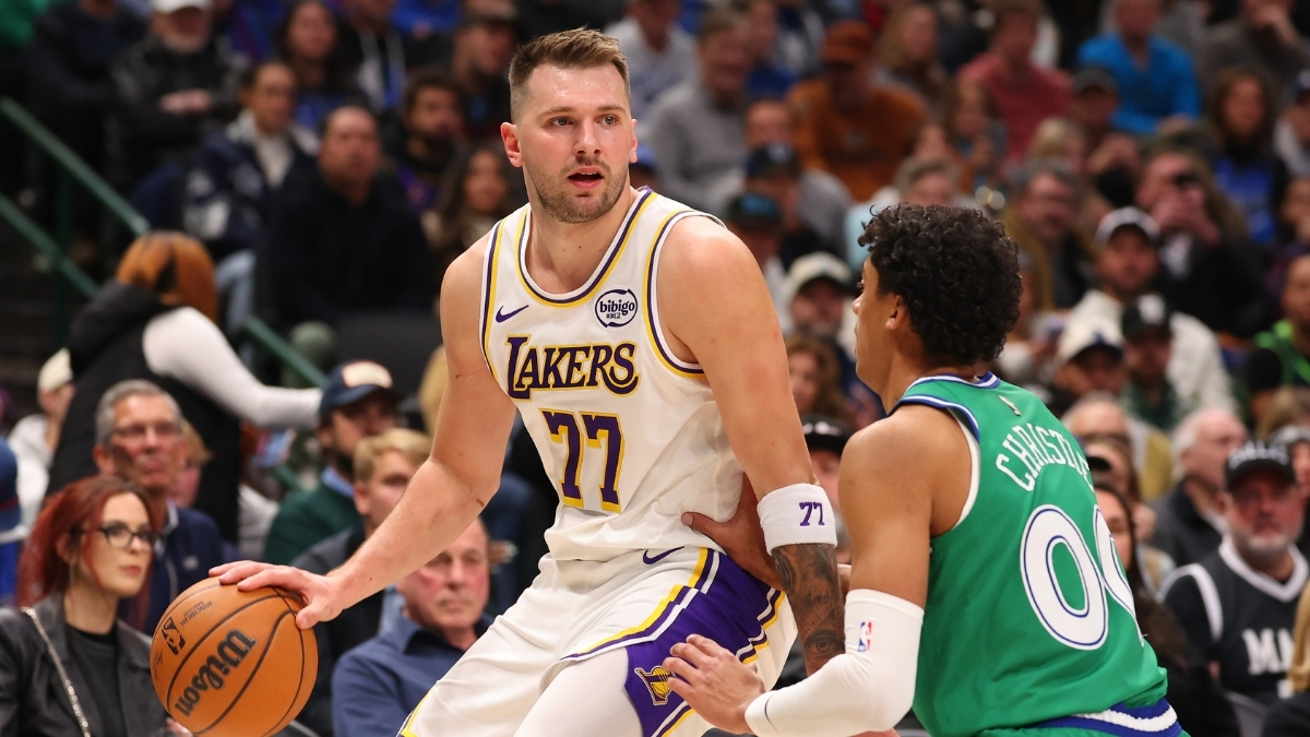 Luka Dončić of the Los Angeles Lakers drives to the basket against Max Christie of the Dallas Mavericks during the first quarter at American Airlines Center on January 24, 2026.