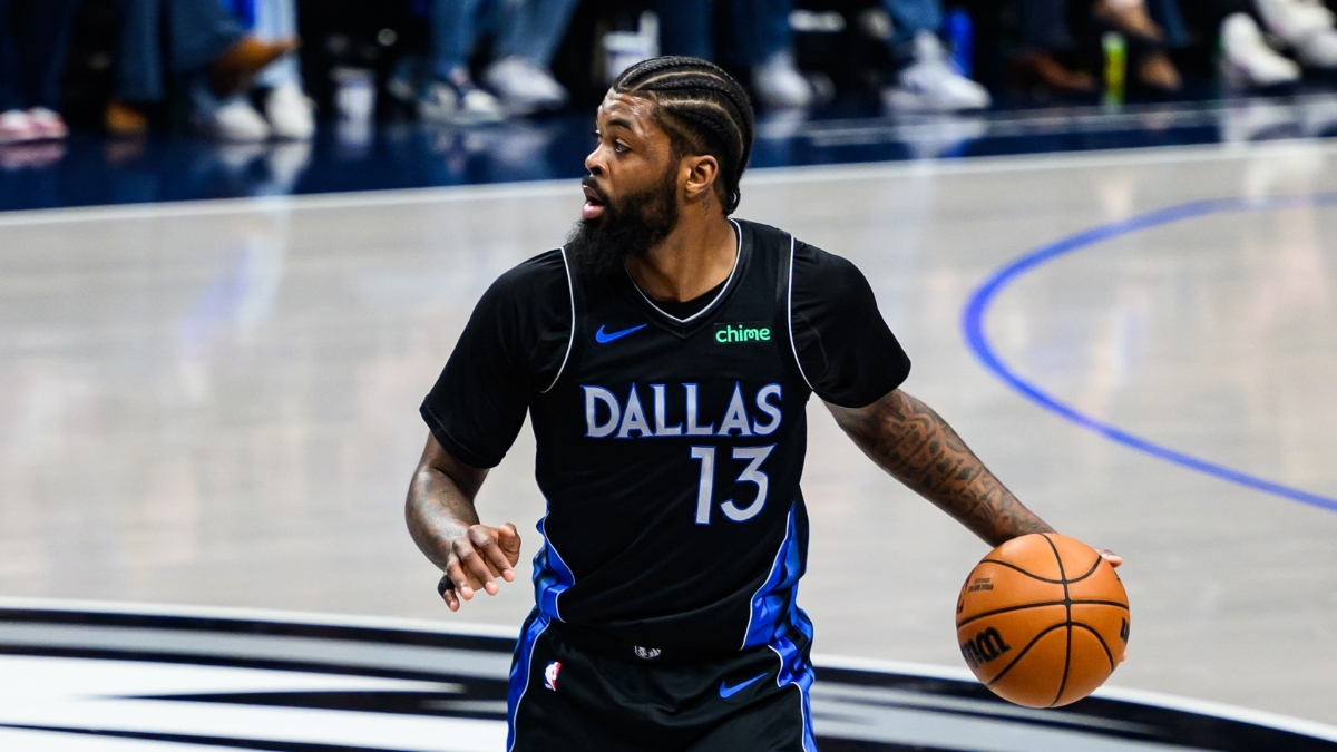Naji Marshall dribbles the ball at American Airlines Center during a game against the Golden State Warriors