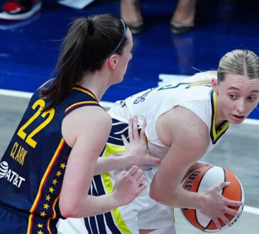WNBA: Paige Bueckers of the Dallas Wings is guarded by Caitlin Clark of the Indiana Fever at Gainbridge Fieldhouse