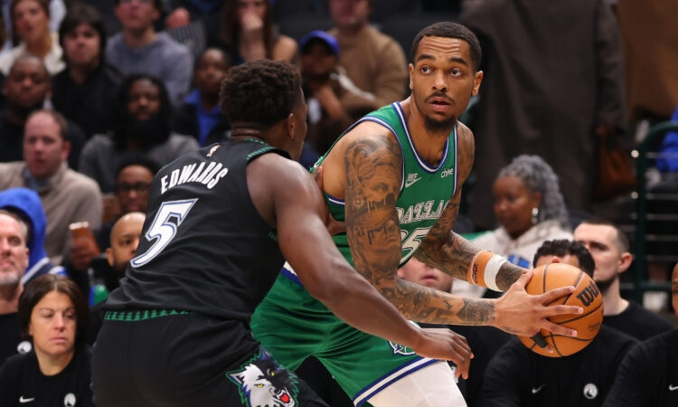 NBA: P.J. Washington is defended by Anthony Edwards during the first quarter at American Airlines Center in a game between the Dallas Mavericks and Minnesota Timberwolves