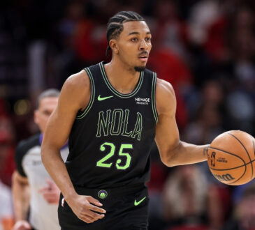 Trey Murphy III dribbles the ball up court for the New Orleans Pelicans against the Houston Rockets at Toyota Center