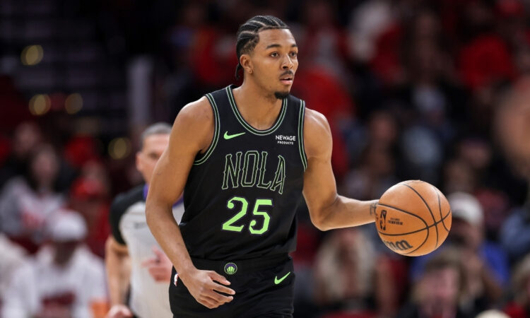 Trey Murphy III dribbles the ball up court for the New Orleans Pelicans against the Houston Rockets at Toyota Center