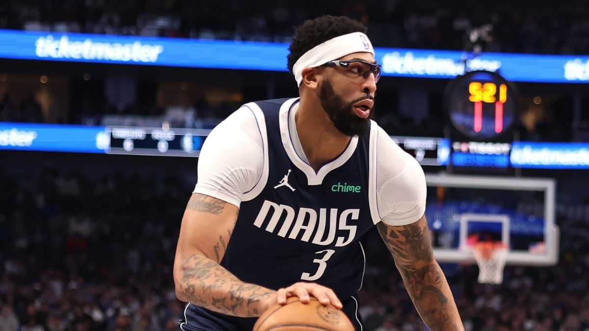 NBA: Anthony Davis controls the ball during the first half at American Airlines Center against the Philadelphia 76ers