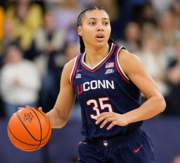 WNBA Draft: Azzi Fudd dribbles up court for UConn against Marquette at Al McGuire Center in Milwaukee.