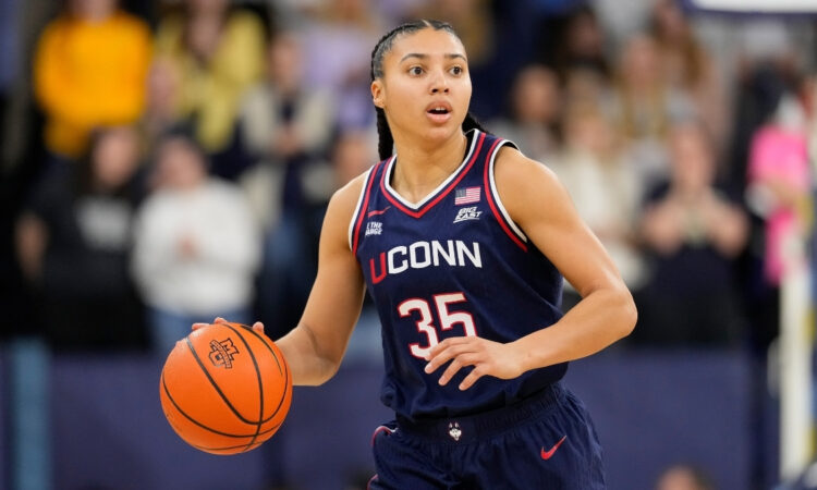 WNBA Draft: Azzi Fudd dribbles up court for UConn against Marquette at Al McGuire Center in Milwaukee.
