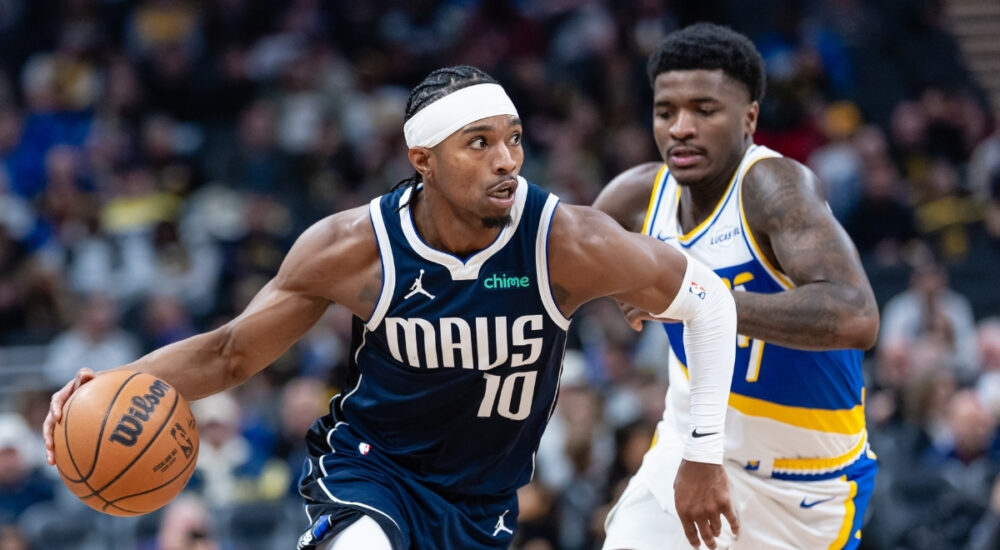 NBA: Brandon Williams dribbles against Kam Jones at Gainbridge Fieldhouse during the Dallas Mavericks' game against the Indiana Pacers.