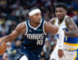 NBA: Brandon Williams dribbles against Kam Jones at Gainbridge Fieldhouse during the Dallas Mavericks' game against the Indiana Pacers.