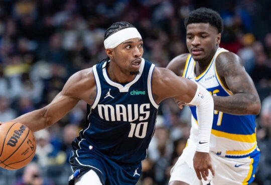 NBA: Brandon Williams dribbles against Kam Jones at Gainbridge Fieldhouse during the Dallas Mavericks' game against the Indiana Pacers.