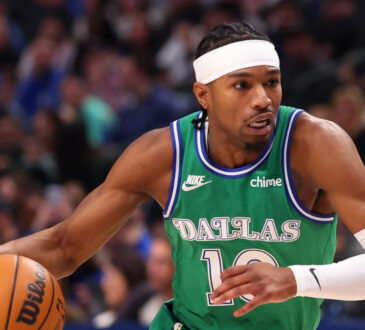 NBA: Brandon Williams controls the ball for the Dallas Mavericks during the first half against the Minnesota Timberwolves at American Airlines Center