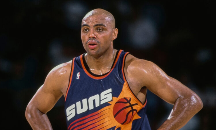 NBA: Charles Barkley looks on with his hands on his hips during a Phoenix Suns game against the Denver Nuggets at McNichols Sports Arena.