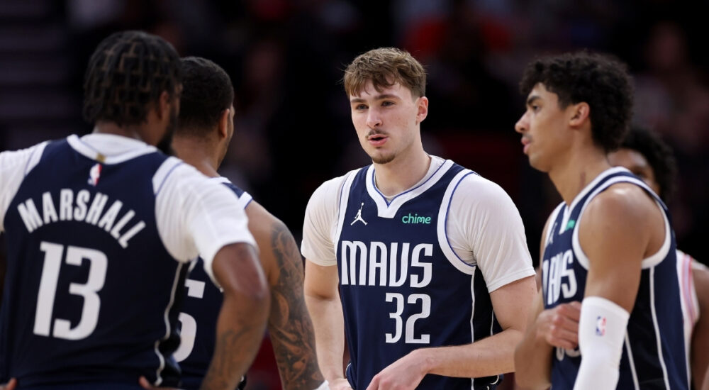 NBA: Cooper Flagg reacts with teammates during the second half at Toyota Center against the Houston Rockets in Houston, Texas.