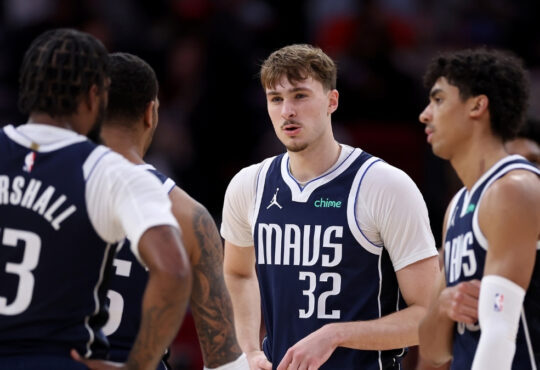 NBA: Cooper Flagg reacts with teammates during the second half at Toyota Center against the Houston Rockets in Houston, Texas.