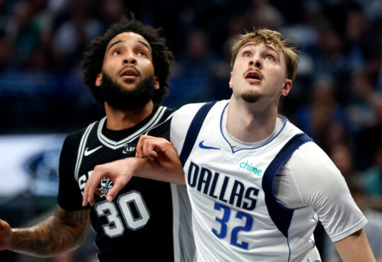 NBA: Cooper Flagg battles for position with Julian Champagnie during the first half at American Airlines Center against the San Antonio Spurs