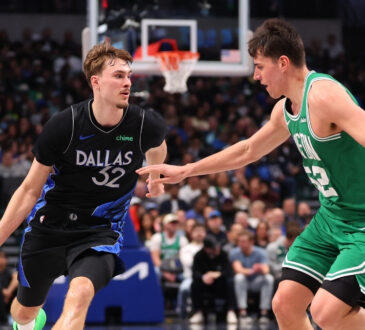 NBA: Cooper Flagg dribbles the ball up court for the Dallas Mavericks against the Boston Celtics at American Airlines Center