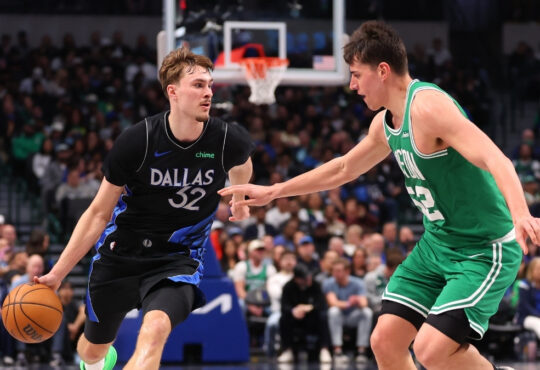 NBA: Cooper Flagg dribbles the ball up court for the Dallas Mavericks against the Boston Celtics at American Airlines Center