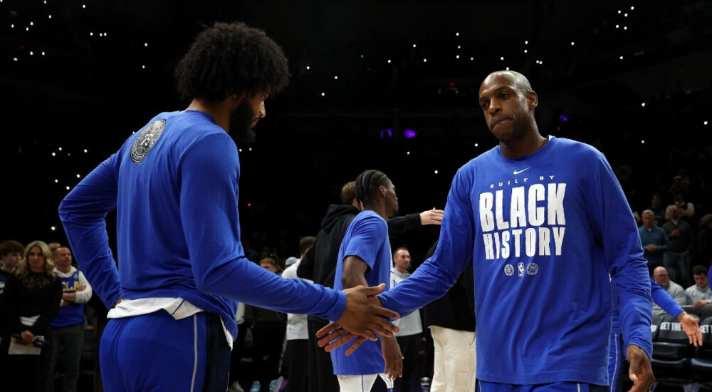 NBA: Khris Middleton walks onto the court during player introductions at Target Center before the Dallas Mavericks faced the Minnesota Timberwolves.