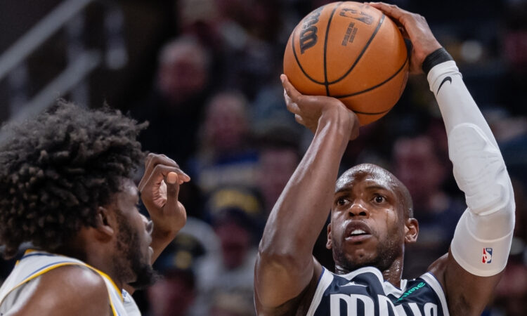 NBA: Khris Middleton shoots the ball for the Dallas Mavericks against the Indiana Pacers at Gainbridge Fieldhouse.