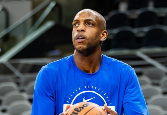 NBA: Khris Middleton shoots during pregame warmups for the Dallas Mavericks in San Antonio before a road game