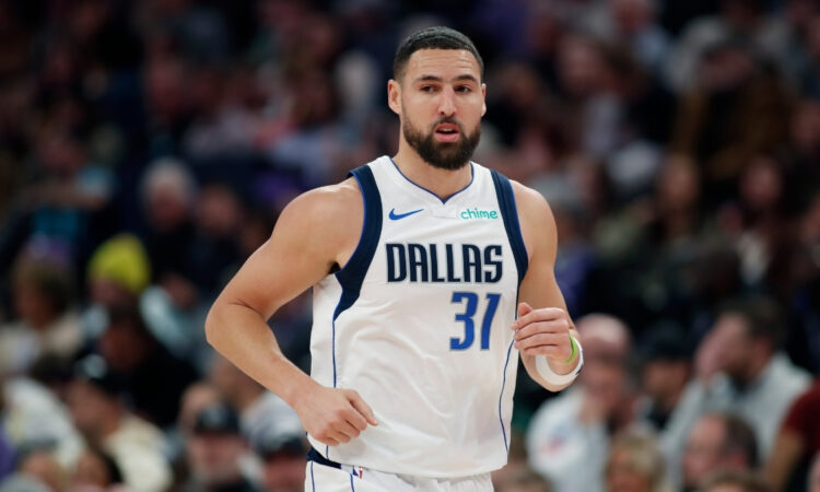 NBA: Klay Thompson runs up the court for the Dallas Mavericks during the first half against the Utah Jazz at the Delta Center