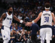 NBA: Kyrie Irving and Klay Thompson celebrate after a score for the Dallas Mavericks against the Orlando Magic at American Airlines Center.