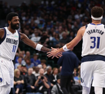 NBA: Kyrie Irving and Klay Thompson celebrate after a score for the Dallas Mavericks against the Orlando Magic at American Airlines Center.