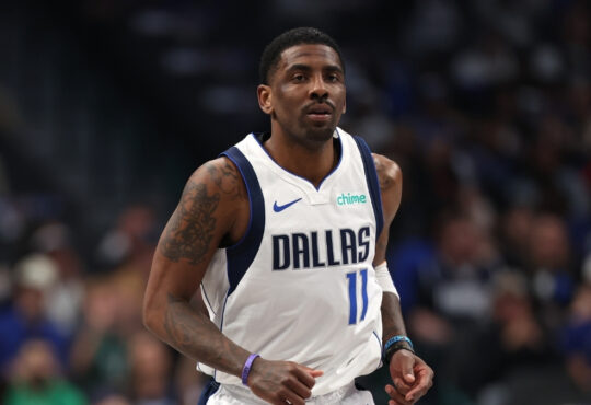 NBA: Kyrie Irving looks on from the court during the first half at American Airlines Center against the Charlotte Hornets