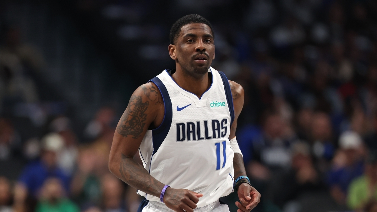 NBA: Kyrie Irving looks on from the court during the first half at American Airlines Center against the Charlotte Hornets