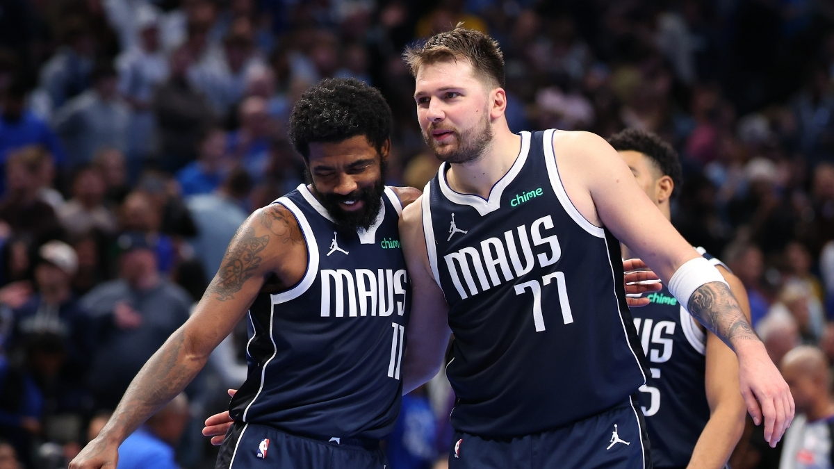 Luka Dončić and Kyrie Irving celebrate for the Dallas Mavericks during an Emirates NBA Cup game against the Memphis Grizzlies at American Airlines Center.