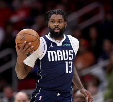 NBA: Naji Marshall brings the ball up court for the Dallas Mavericks against the Houston Rockets at Toyota Center.