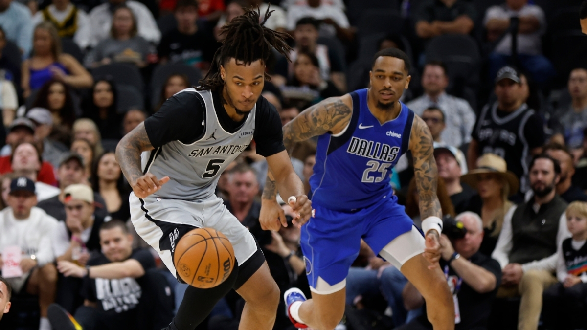 NBA: Stephon Castle makes a steal for the San Antonio Spurs against the Dallas Mavericks at Frost Bank Center