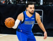 NBA: Tyus Jones passes the ball during his Dallas Mavericks debut in San Antonio