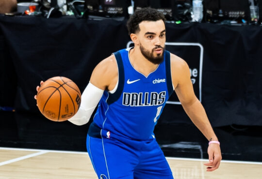 NBA: Tyus Jones passes the ball during his Dallas Mavericks debut in San Antonio