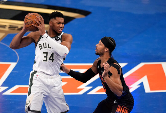 Josh Hart guards Giannis Antetokounmpo