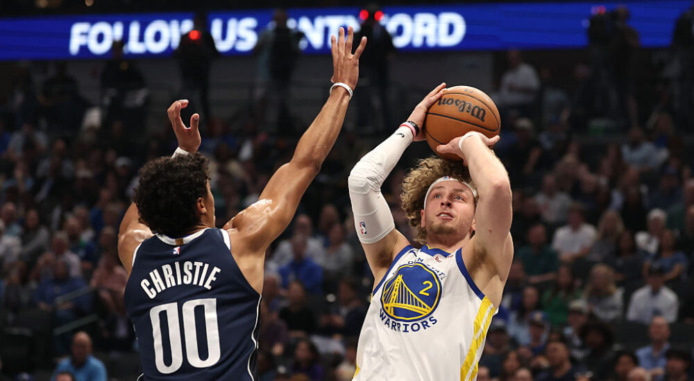 Dallas Mavericks guard Max Christie guards Golden State Warriors guard Brandin Podziemski