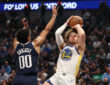 Dallas Mavericks guard Max Christie guards Golden State Warriors guard Brandin Podziemski