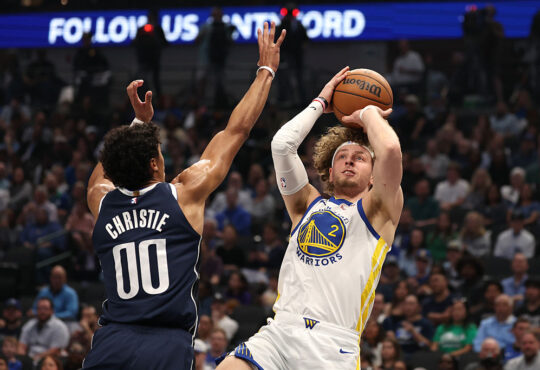 Dallas Mavericks guard Max Christie guards Golden State Warriors guard Brandin Podziemski